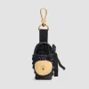 Ikonischer Bucket Charm aus Raffiabast