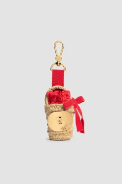 Ikonischer Bucket Charm aus Raffiabast
