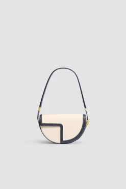 Le Patou Tasche aus Leder und Canvas