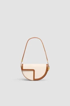 Le Patou Tasche aus Leder und Canvas